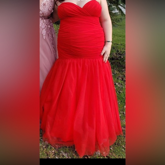 This gorgeous red prom dress is a size 20 but it definitely fits smaller. - Picture 1 of 4